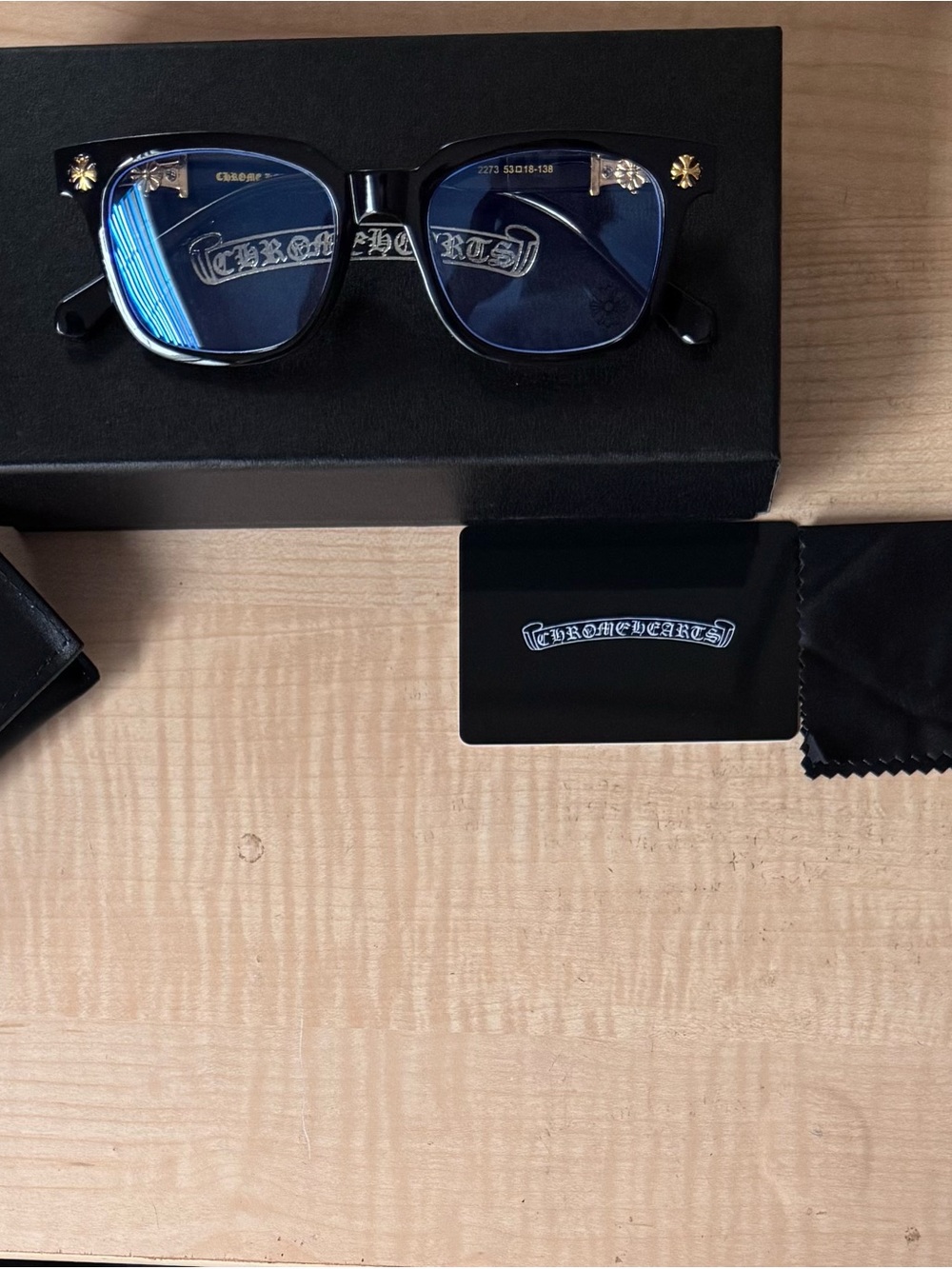 Chrome Hearts Black Frame Sunglasses with Blue Lenses and Gold Accents